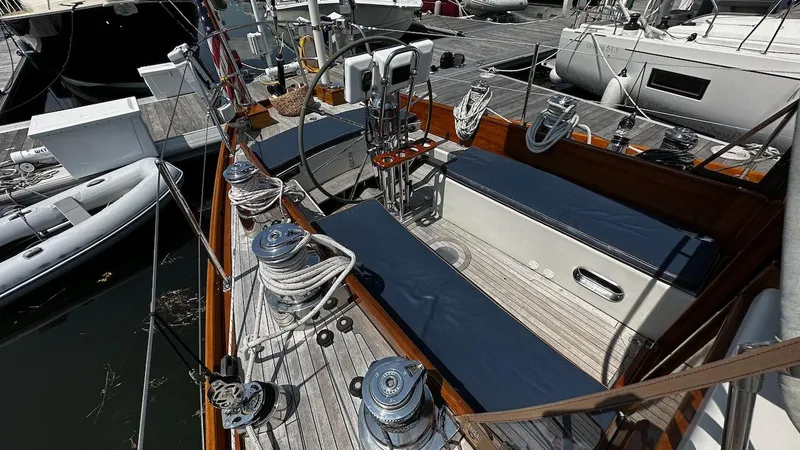 Slide: The Image of 2004 Lyman-Morse Sparkman & Stephens Sloop cockpit with winches and steering wheel. - 8