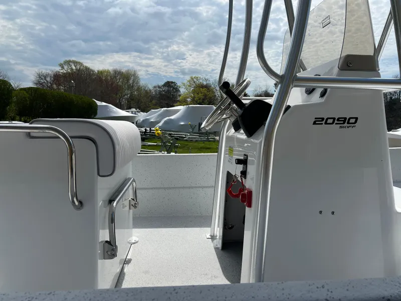 Slide: The Image of 2024 Maritime 2090 Skiff boat interior with console and seating. - 9