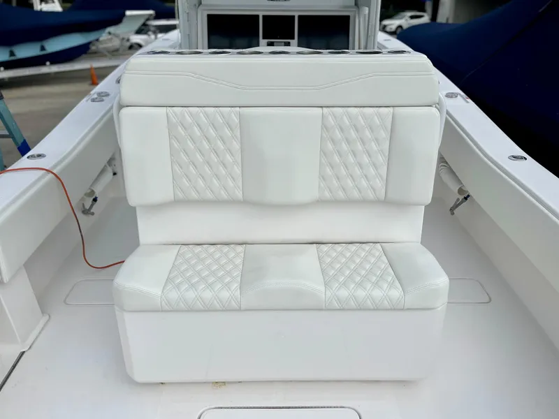 Slide: The Image of 2023 Invincible 36' Open Fisherman boat with white cushioned seating. - 21