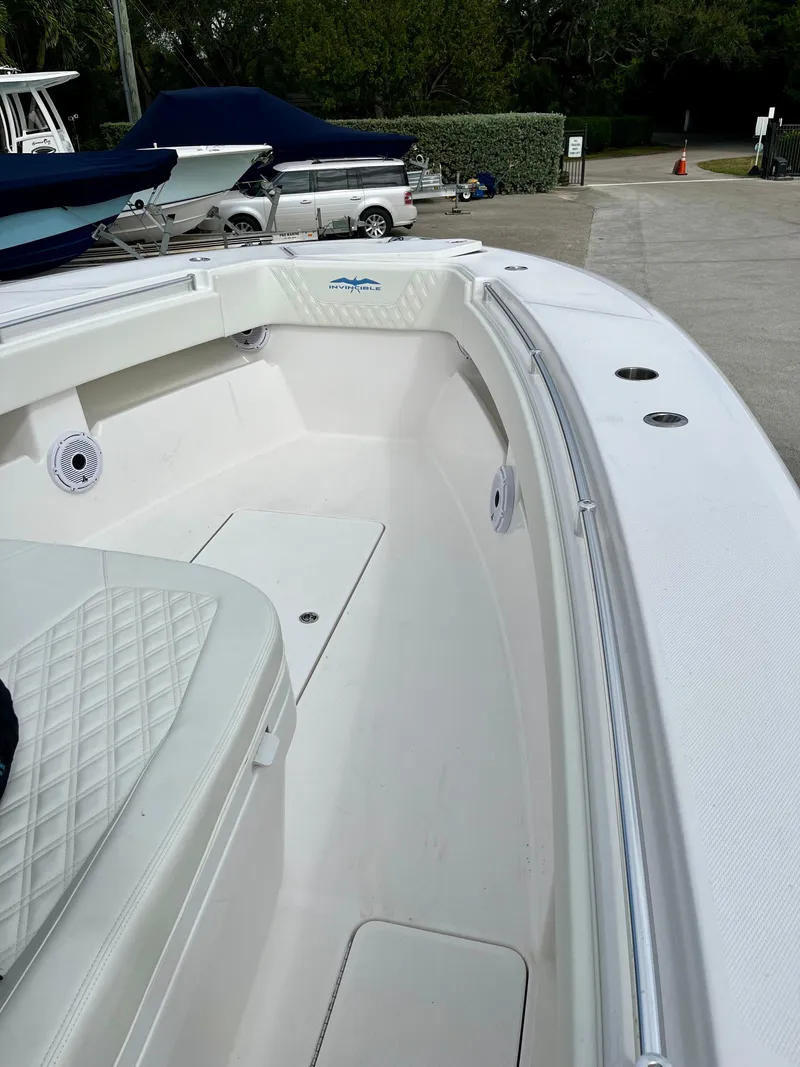 Slide: The Image of 2023 Invincible 36' Open Fisherman boat, white interior, docked. - 5