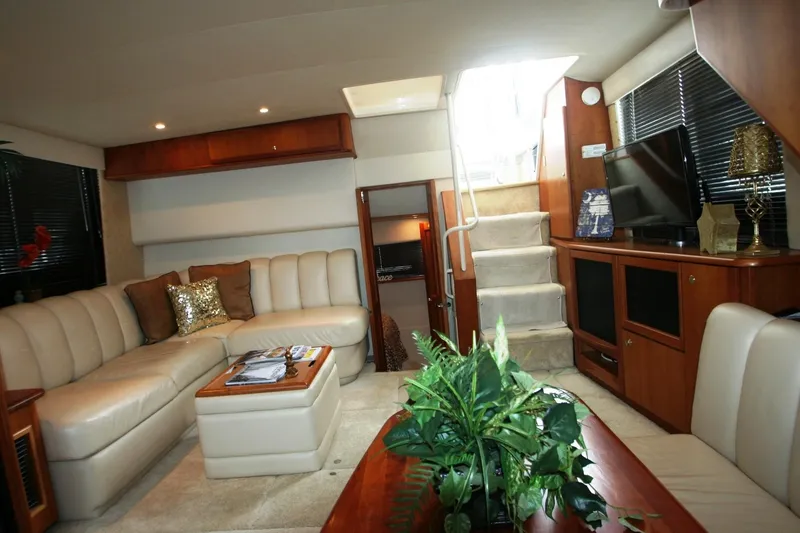 Slide: The Image of Luxurious interior of a 2000 Silverton 392 Motor Yacht with plush seating and modern amenities. - 33