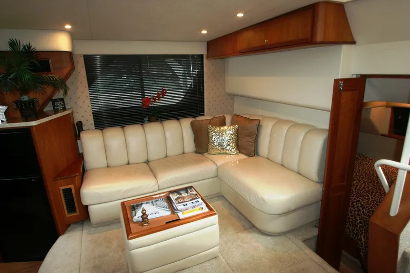 Slide: The Image of Luxurious interior of 2000 Silverton 392 Motor Yacht with cream leather seating and modern decor. - 38