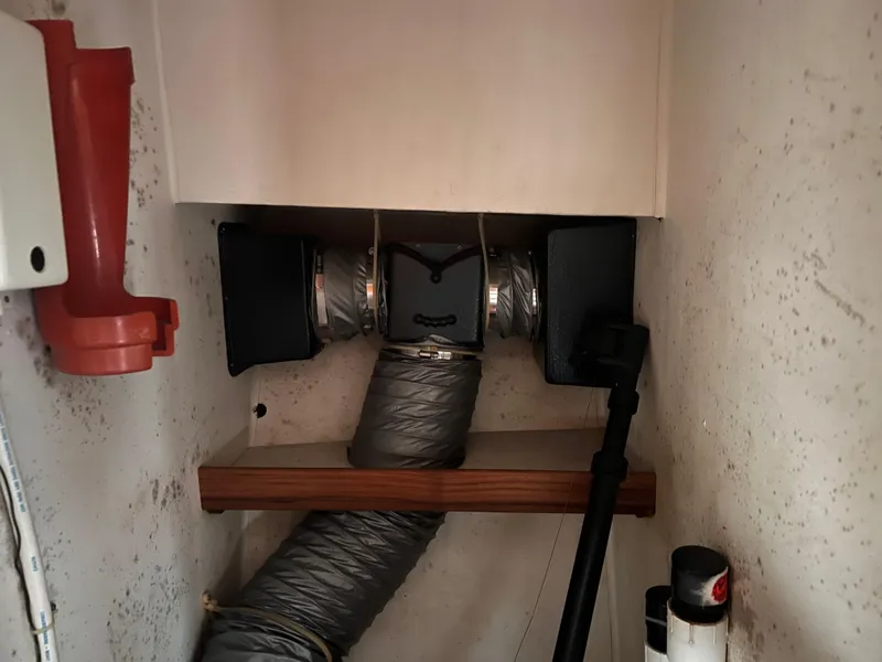 Slide: The Image of Engine room ventilation system in a 1988 Canyon Bay 40 boat. - 25