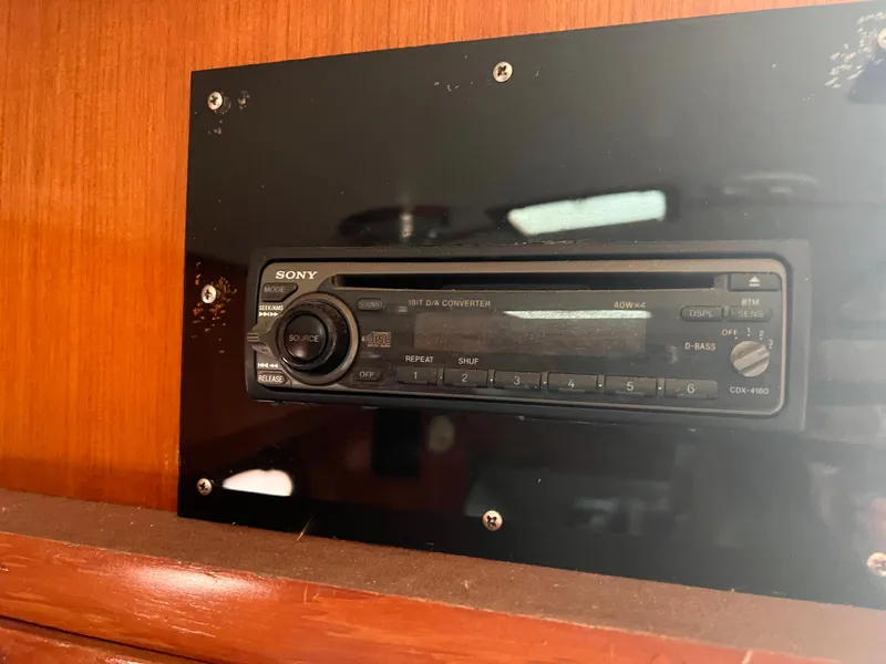 Slide: The Image of Sony CDX-4160 stereo system installed in a 1988 Canyon Bay 40 boat interior. - 38