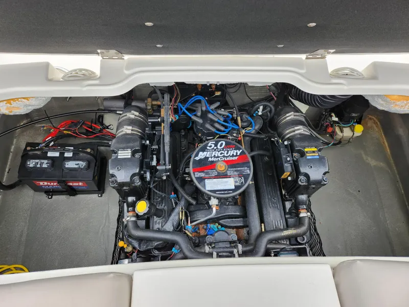 Slide: The Image of 2008 Glastron GT 205 boat engine compartment with 5.0 Mercury MerCruiser engine. - 25