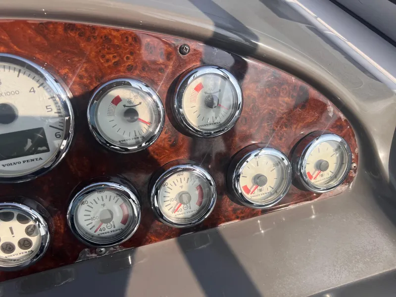 Slide: The Image of Dashboard of a 2011 Regal 35 Express Cruiser with Volvo Penta gauges. - 17