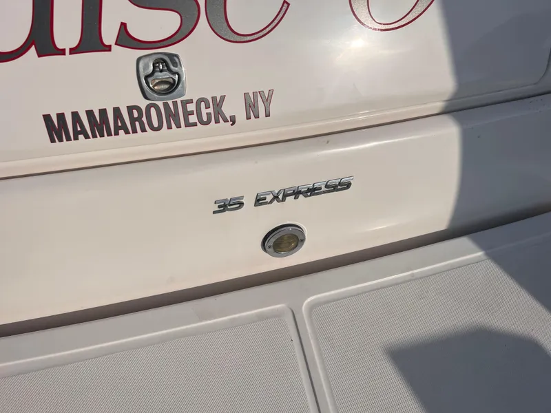 Slide: The Image of 2011 Regal 35 Express Cruiser boat with Mamaroneck, NY lettering. - 4