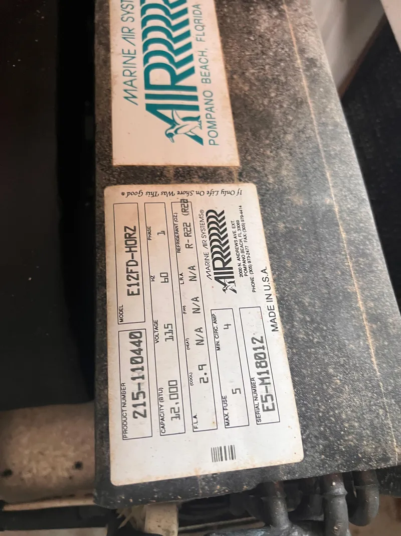 Slide: The Image of Label on Marine Air Systems unit, Pursuit 3100 Open, 1996 model. - 30