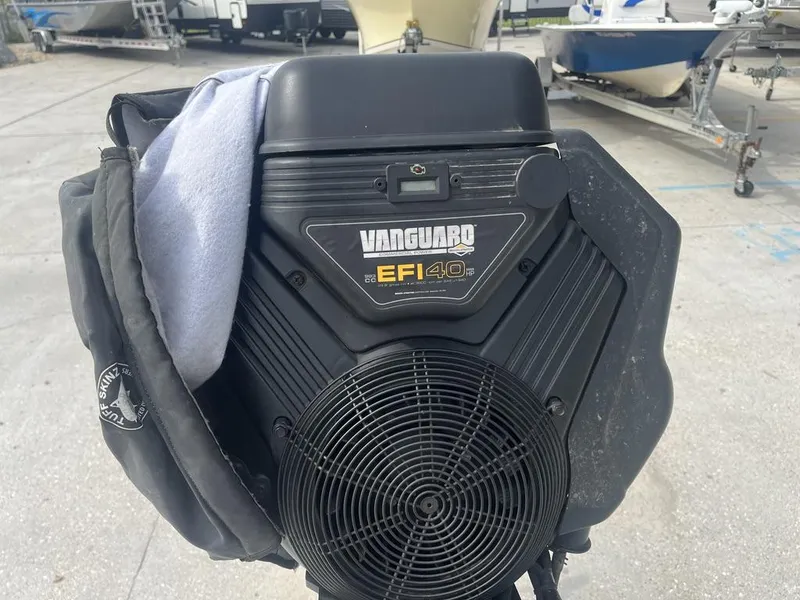 Slide: The Image of Close-up of Vanguard EFI 40 HP engine on a 2020 Custom 20 Crawfish Skiff. - 12