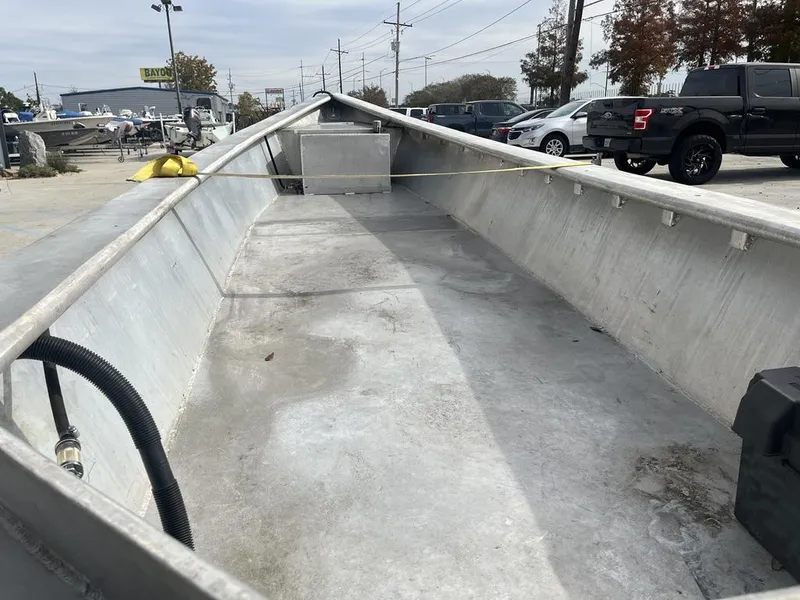 Slide: The Image of Custom 2020 Crawfish Skiff boat interior, aluminum hull, parked outdoors. - 6