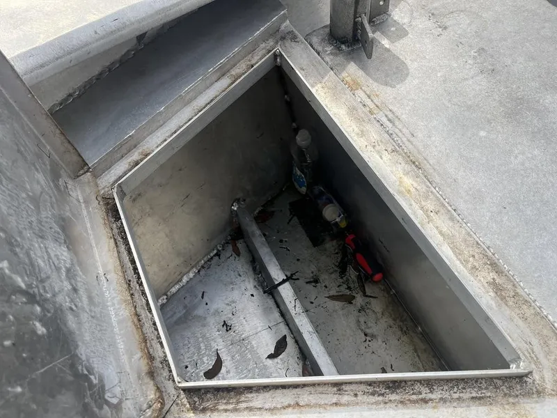 Slide: The Image of Open storage compartment of a 2020 Custom 20 Crawfish Skiff boat. - 7