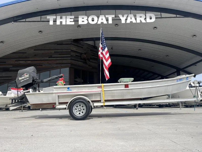 Slide: The Image of 2020 Custom 20 Crawfish Skiff on trailer at The Boat Yard. - 9