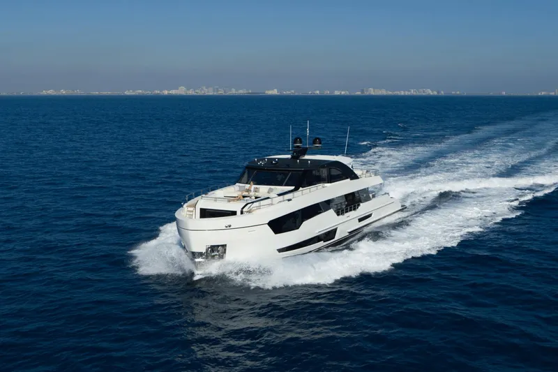 Slide: The Image of Ocean Alexander 32E 2023 luxury yacht cruising on open sea. - 1