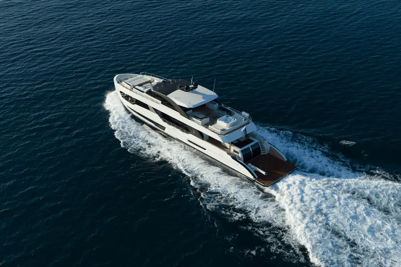 Slide: The Image of 2023 Ocean Alexander 32E yacht cruising on open water. - 10