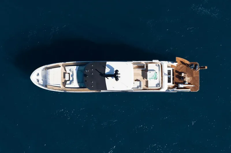Slide: The Image of Aerial view of 2023 Ocean Alexander 32E luxury yacht on open water. - 12