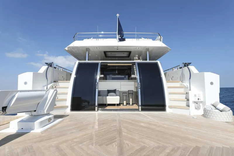 Slide: The Image of Ocean Alexander 32E 2023 yacht, rear view with open deck and luxurious interior. - 14