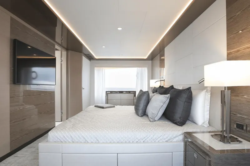 Slide: The Image of Luxurious bedroom interior of 2023 Ocean Alexander 32E yacht with modern design and ambient lighting. - 21