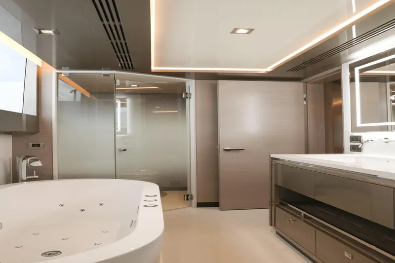 Slide: The Image of Luxurious bathroom on the 2023 Ocean Alexander 32E yacht with modern fixtures and elegant design. - 22
