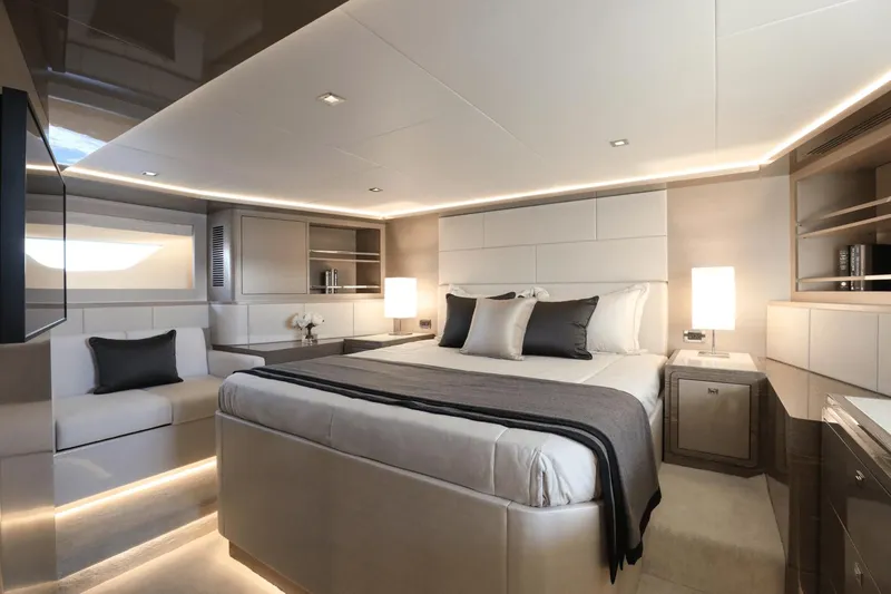 Slide: The Image of Luxurious bedroom interior of 2023 Ocean Alexander 32E yacht with modern design and ambient lighting. - 23