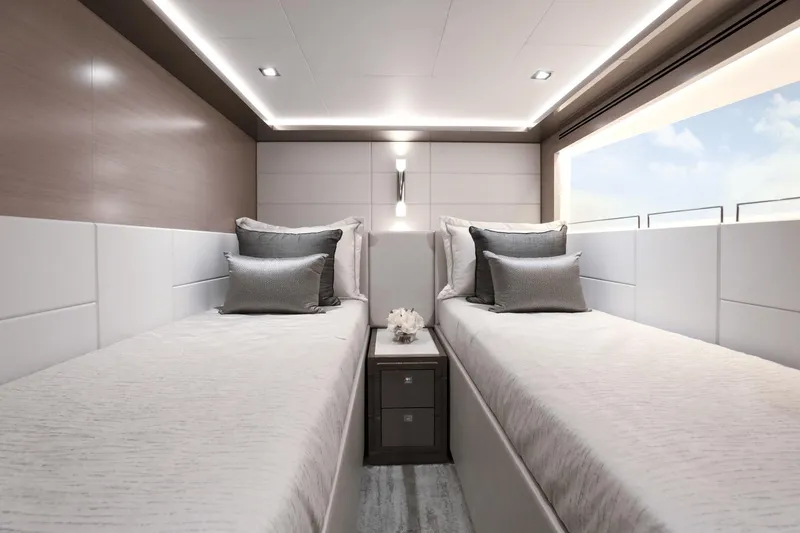 Slide: The Image of Modern twin bedroom on the 2023 Ocean Alexander 32E yacht with elegant decor. - 28
