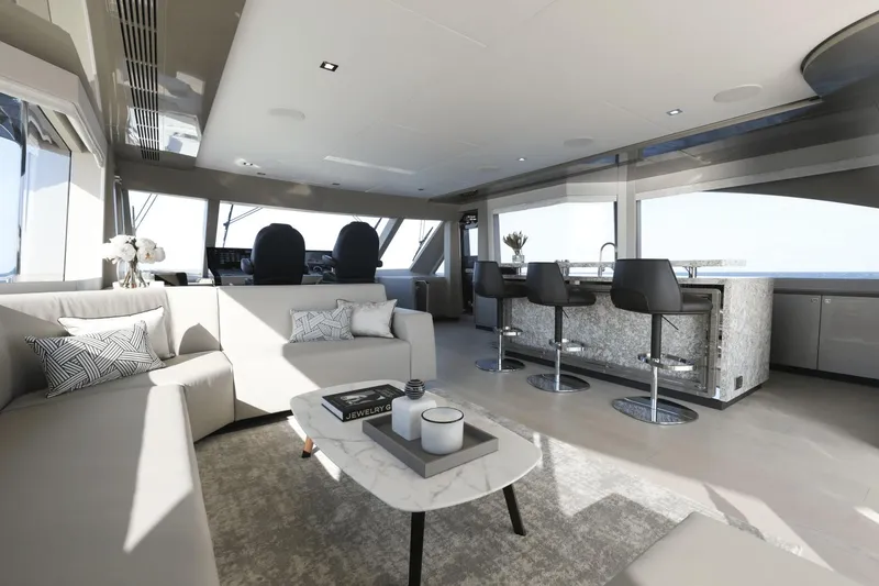 Slide: The Image of Luxurious interior of 2023 Ocean Alexander 32E yacht with modern seating and bar area. - 31