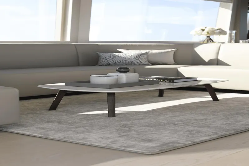 Slide: The Image of Modern interior of Ocean Alexander 32E 2023 yacht with sleek coffee table and plush seating. - 33