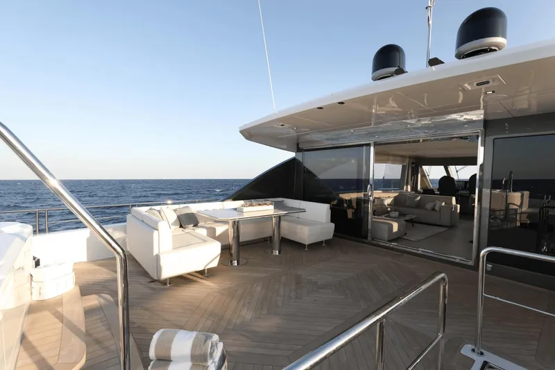 Slide: The Image of Luxury deck of 2023 Ocean Alexander 32E yacht with ocean view and modern seating. - 38