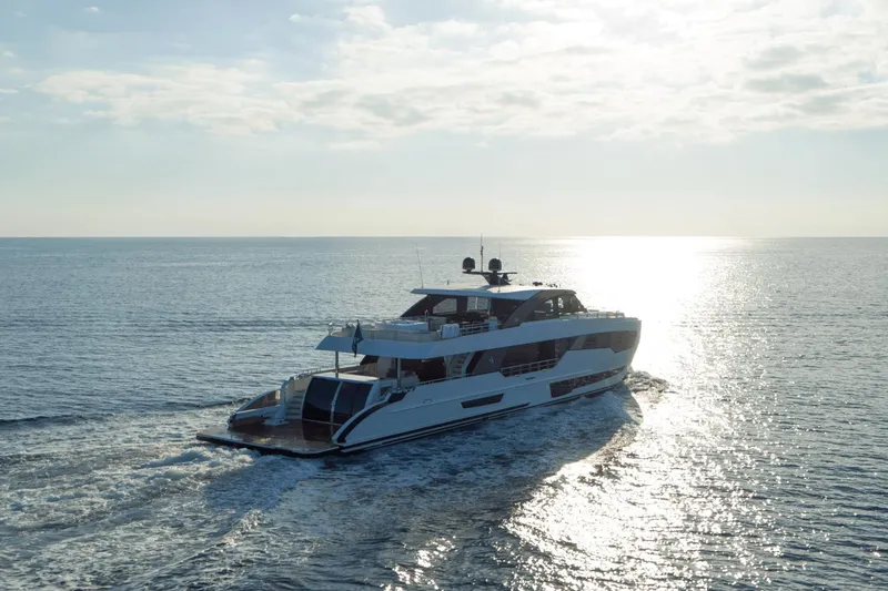 Slide: The Image of Luxury yacht Ocean Alexander 32E 2023 cruising on open sea at sunset. - 5