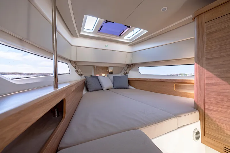 Slide: The Image of Luxurious interior of 2025 Nimbus W11 yacht cabin with skylight and modern design. - 10