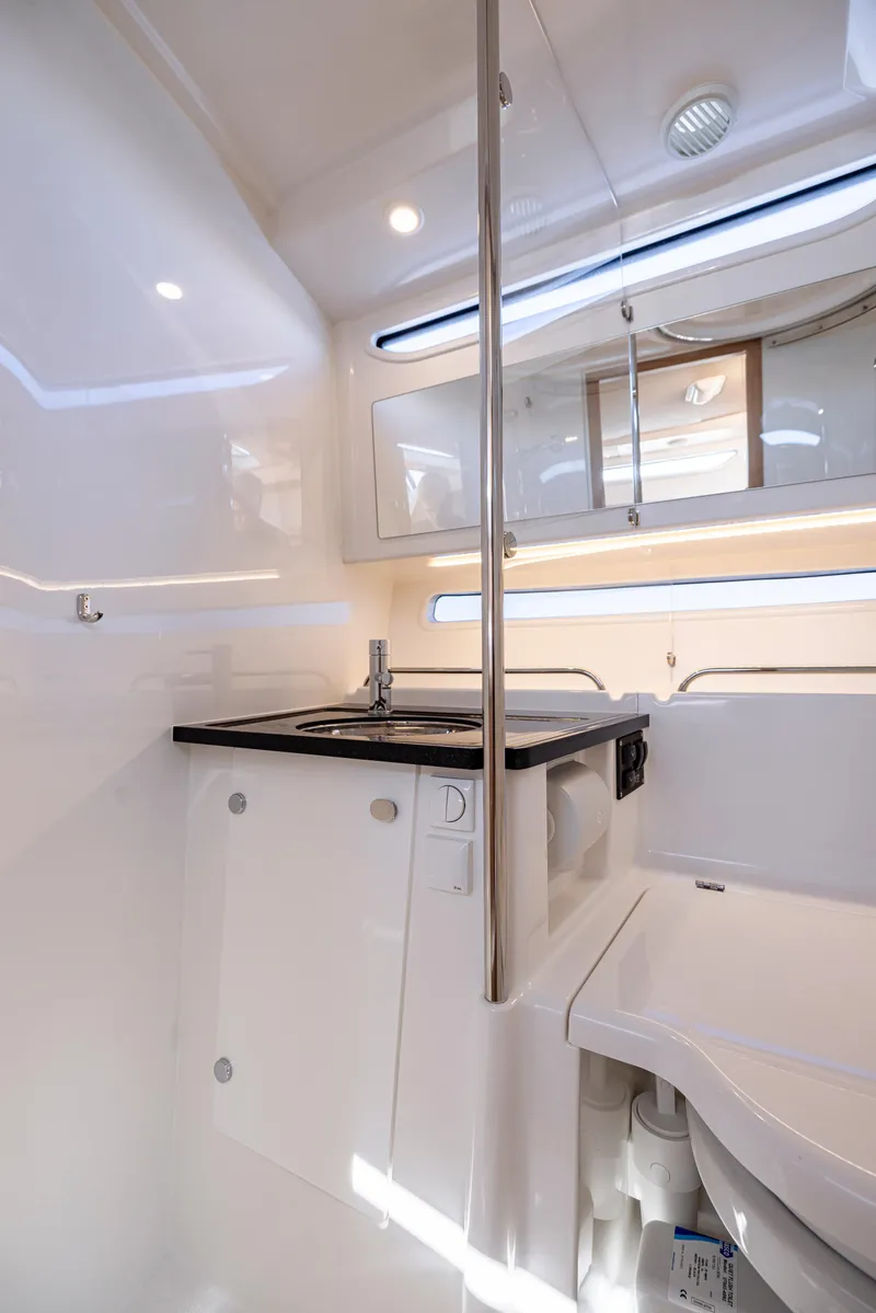 Slide: The Image of Modern bathroom interior of 2025 Nimbus W11 yacht, featuring sleek design and compact amenities. - 13