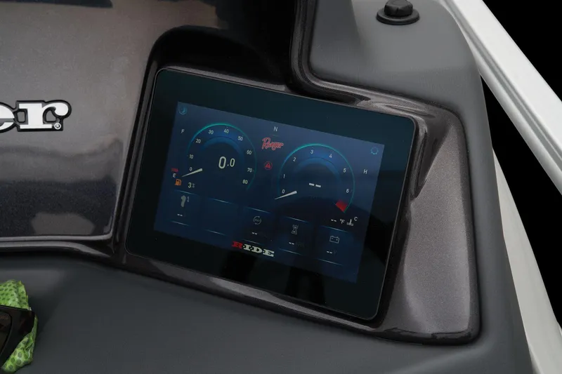 Slide: The Image of 2024 Ranger Reata 243C digital dashboard display showing speed and fuel gauges. - 49