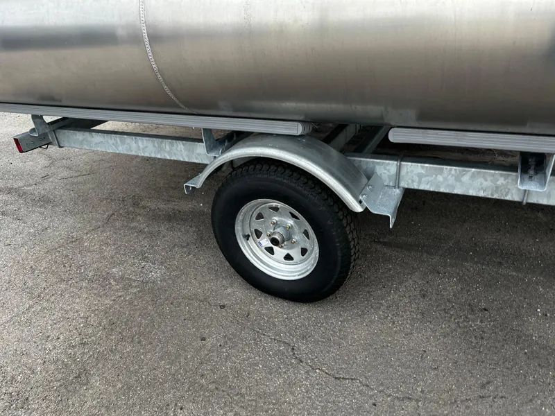 Slide: The Image of 2024 Bentley Pontoons LE 180 3 PT trailer wheel and pontoon detail. - 18