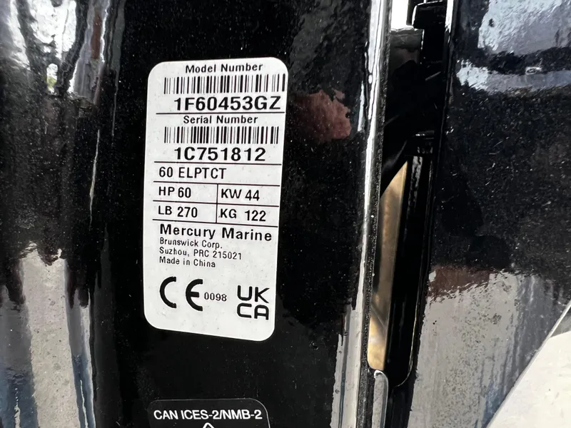 Slide: The Image of Close-up of a 2024 Bentley Pontoons LE 180 3 PT model number and serial number label. - 19