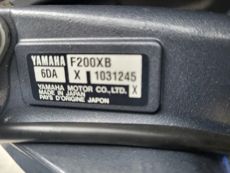 Slide: The Image of Yamaha F200XB engine label on a 2018 Steiger Craft 21 DV MIAMI boat. - 15