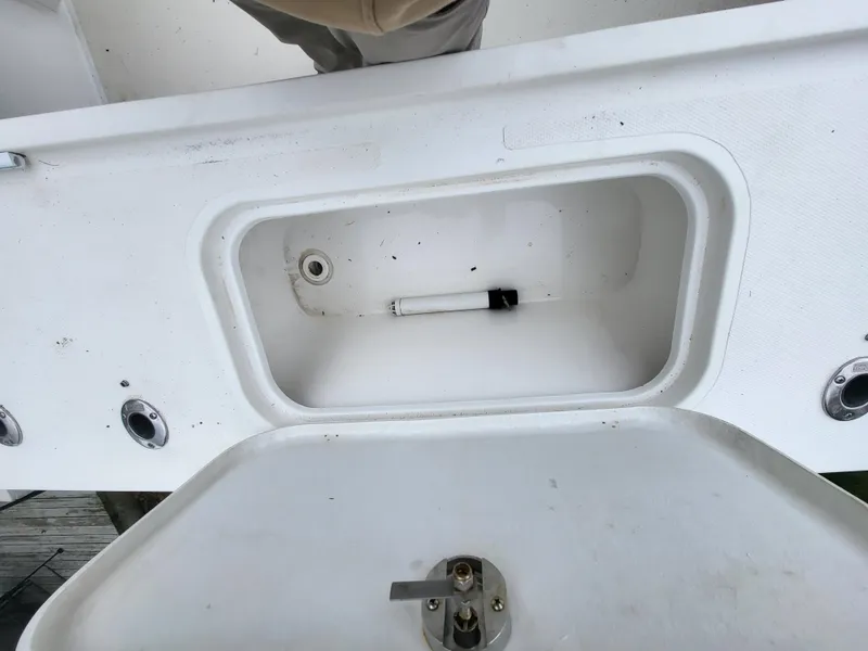 Slide: The Image of 2018 Steiger Craft 21 DV MIAMI boat storage compartment with open lid. - 23