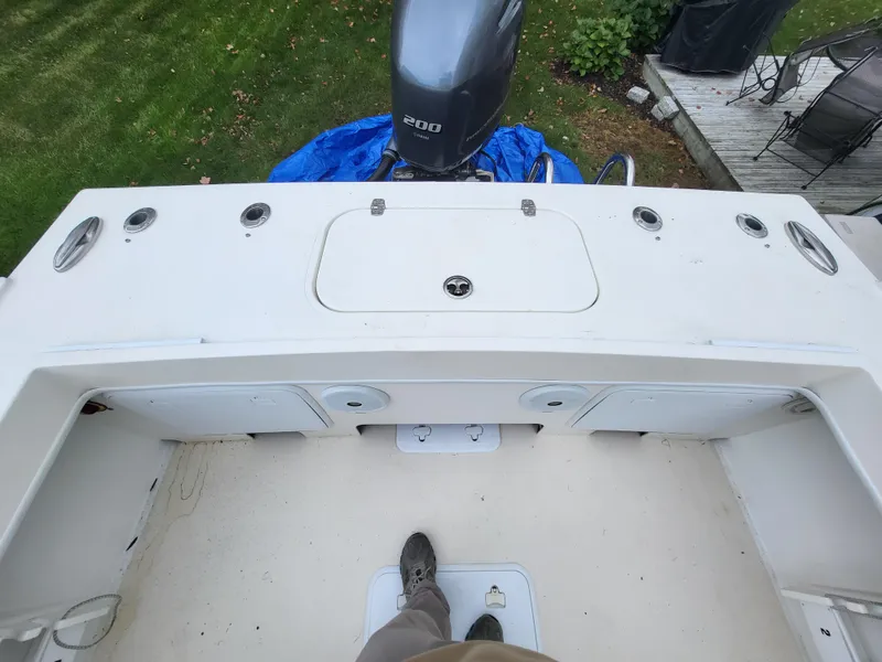 Slide: The Image of 2018 Steiger Craft 21 DV MIAMI boat deck with outboard motor. - 24