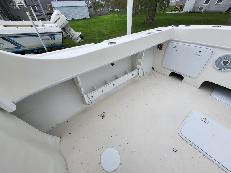 Slide: The Image of 2018 Steiger Craft 21 DV MIAMI boat interior, showing storage compartments and clean deck. - 26