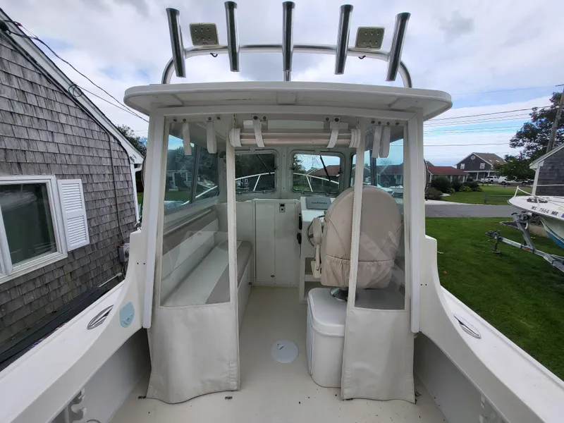 Slide: The Image of 2018 Steiger Craft 21 DV MIAMI boat cockpit with seating and helm station. - 35
