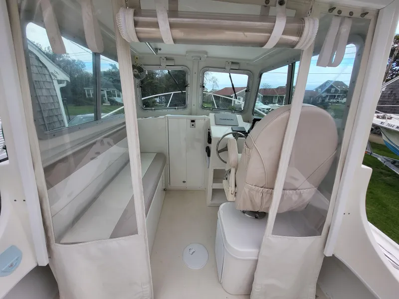 Slide: The Image of 2018 Steiger Craft 21 DV MIAMI boat interior with helm and seating. - 42