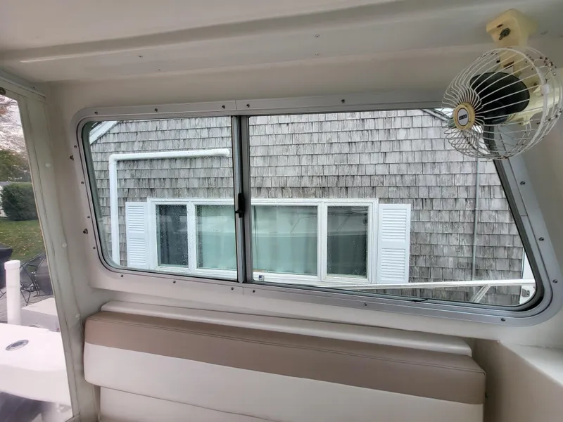 Slide: The Image of Interior view of 2018 Steiger Craft 21 DV MIAMI boat with window and seating. - 48