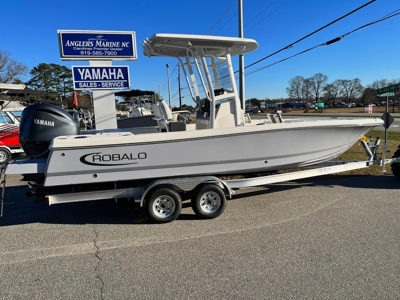 The Image of 2024 Robalo 246 Cayman boat on a trailer at Angler's Marine NC. - 1