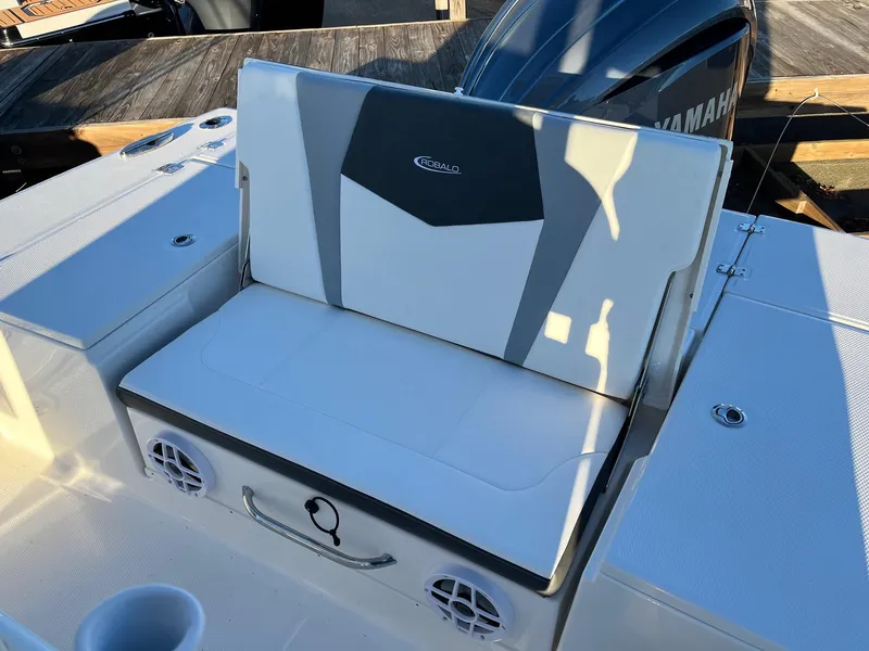 Slide: The Image of 2024 Robalo 246 Cayman boat seat with storage and speakers. - 8