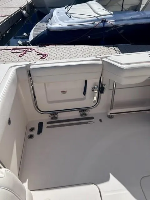 Slide: The Image of 2019 Grady-White Freedom 325 boat interior cockpit door - 6