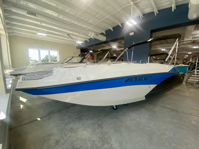Slide: The Image of 2024 Starcraft SVX 191 boat in showroom, side view. - 1