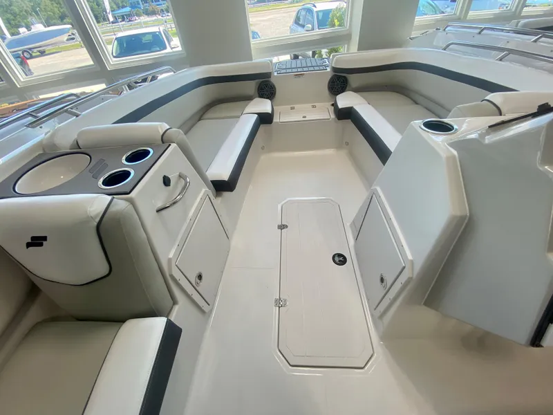 Slide: The Image of 2024 Starcraft SVX 191 boat interior with spacious seating and storage compartments. - 12