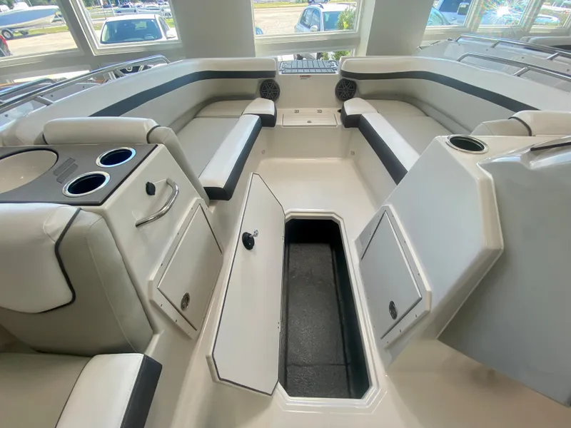 Slide: The Image of 2024 Starcraft SVX 191 boat interior with seating and storage compartments. - 13