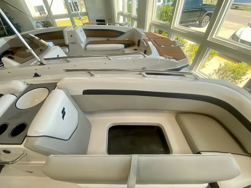 Slide: The Image of 2024 Starcraft SVX 191 boat interior with seating and storage compartments. - 21