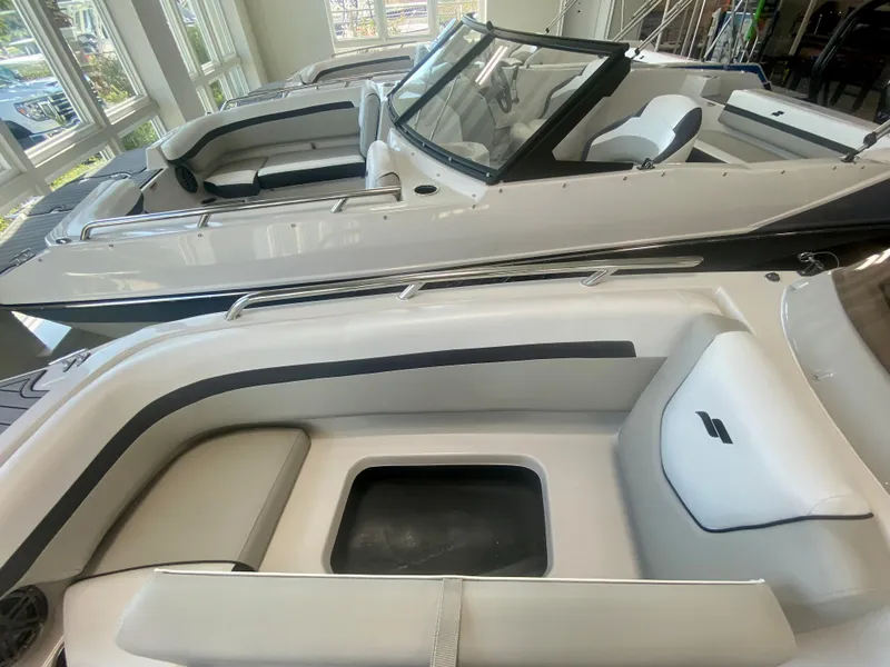 Slide: The Image of 2024 Starcraft SVX 191 boat interior with seating and storage compartments. - 22