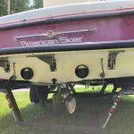 Slide: The Image of 1993 American Skier Legend boat rear view showing propeller and exhaust. - 2