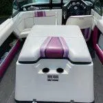 Slide: The Image of 1993 American Skier Legend boat interior with white and purple upholstery. - 3